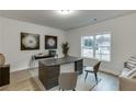 Bright office with large window and a modern desk, creating a functional workspace at 1240 Ainsworth Aly # 39, Sugar Hill, GA 30518