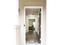 Inviting entryway with wood-look flooring, a decorative rug, and views to the living area at 3442 Old Towne Ln, Cumming, GA 30040