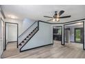 Inviting living room showcasing the staircase, hardwood floors, and elegant trim details at 430 Pilgrim Ln, Powder Springs, GA 30127