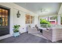 Welcoming front porch with comfortable seating and stylish decor at 3251 Pinestream Nw Rd, Atlanta, GA 30327