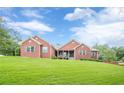 Lovely single-story brick home with a well-maintained lawn and inviting curb appeal at 516 Main St, Hiram, GA 30141