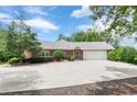 Spacious home featuring a driveway leading to an attached two-car garage at 516 Main St, Hiram, GA 30141