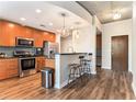 Modern kitchen with stainless steel appliances and an island with bar stool seating at 3300 Windy Ridge Se Pkwy # 718, Atlanta, GA 30339