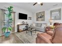 Cozy living room with stylish decor, comfortable seating, and natural light at 779 Sanders Rd, Cumming, GA 30041