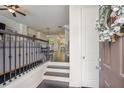 Inviting entryway featuring hardwood floors, staircase and a glimpse of the living area at 1188 Parktown Dr, Mableton, GA 30126
