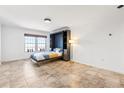 Bright living area featuring tile floors, recessed lighting, and a large window for ample natural light at 199 14Th Ne St # 2312, Atlanta, GA 30309