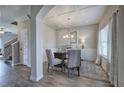 Stylish home office featuring coffered ceilings, custom millwork, and modern light fixture at 200 Eva Way Ne, Cartersville, GA 30121
