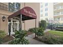 Well-maintained building entrance with landscaping and modern architectural details at 395 Pharr Ne Rd # 103, Atlanta, GA 30305