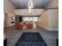 Welcoming lobby featuring a stylish rug, comfortable seating, and a view of the entrance creates a warm ambiance at 711 Cosmopolitan Ne Dr # 338, Atlanta, GA 30324