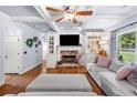 Comfortable living room with coffered ceilings and a stone fireplace at 501 Rabun Ct, Canton, GA 30115