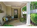 Cozy front porch with comfortable seating and a decorative entrance door at 4068 Cottage Oaks Dr, Acworth, GA 30101
