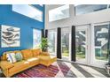 Bright living space with large windows providing natural light, complementing the modern interior design and decor at 3120 Godby Rd, Atlanta, GA 30349