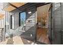Stylish home featuring a modern porch, sleek exterior and inviting front entrance at 988 Mcdaniel Sw St, Atlanta, GA 30310
