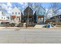 A row of modern homes with individual designs, enhanced by landscaped front yards at 988 Mcdaniel Sw St, Atlanta, GA 30310