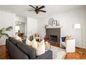 Bright and airy living room with fireplace, hardwood floors, neutral decor and lots of natural light at 513 Boulevard Se, Atlanta, GA 30312