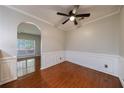 Bright and airy dining room with hardwood floors, crown molding, and a ceiling fan at 4844 W Park Cir # 4844, College Park, GA 30349