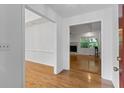 Inviting foyer with gleaming hardwood floors leading to a living area at 55 Fox Chase, Covington, GA 30016