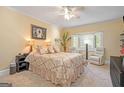 Relaxing bedroom featuring an inviting color palette, soft lighting, and a large window at 3192 Paces Mill Rd, Atlanta, GA 30339