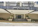 Elegant building entrance at 2499 Peachtree Road with manicured landscaping and inviting access at 2499 Peachtree Ne Rd # 108, Atlanta, GA 30305