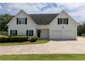 Spacious home with a two car garage and a well-maintained front yard at 255 Henson Way, Canton, GA 30115