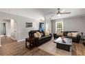Comfortable living room with hardwood floors, a ceiling fan, and natural light at 1140 Moorestown Cir, Decatur, GA 30033