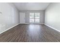 Bright and spacious living room with wood floors and natural light at 340 Onyx Ct, Atlanta, GA 30349