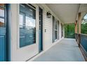 Inviting front porch featuring classic details and ample space for relaxing, enhancing the home's charm at 3664 Nessa Se Ct, Smyrna, GA 30082
