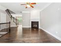 Spacious living room with hardwood floors, fireplace, and natural light at 2252 Limehurst Ne Dr, Atlanta, GA 30319