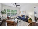 Comfortable living room with stylish furniture and a large window at 2700 Pine Tree Ne Rd # 1208, Atlanta, GA 30324