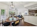 Open living space with dining area, living room and kitchen area at 2700 Pine Tree Ne Rd # 1208, Atlanta, GA 30324