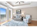 Cozy living room with plush seating, large windows, and a scenic ocean view at 325 E Paces Ferry Rd # 2003, Atlanta, GA 30305