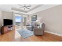Comfortable living space featuring water views, hardwood floors, and contemporary decor at 325 E Paces Ferry Rd # 2003, Atlanta, GA 30305