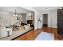 Spacious living room with fireplace, hardwood floors, and neutral color palette at 5270 Forest Brook Pkwy, Marietta, GA 30068