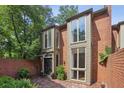 Stylish brick home with large windows offers natural light and a contemporary feel at 49 Willow Gln, Atlanta, GA 30342