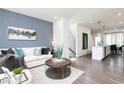 Inviting living room featuring stylish decor, wood floors, and an open layout at 2676 Brookview Nw Ln, Atlanta, GA 30318