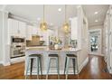 Modern kitchen with stainless steel appliances and stylish island seating perfect for casual dining at 1199 Huff Nw Rd # 127, Atlanta, GA 30318