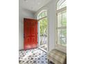 Foyer with patterned tile floor, red front door, and natural light from windows, creating a welcoming entry at 461 Bartram Se St # A, Atlanta, GA 30316