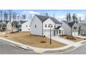 Beautifully designed two-story home with a two-car garage, landscaped yard, and modern curb appeal at 1851 Lacebark Elm Way, Lawrenceville, GA 30045