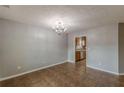 View of the dining room leading to the kitchen with updated appliances at 150 Alton Cir, Villa Rica, GA 30180