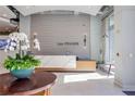 Elegant lobby area with a marble reception desk, modern lighting, and an inviting seating area at 250 Pharr Ne Rd # 1112, Atlanta, GA 30305