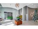 Grand lobby featuring a modern design, high ceilings, stylish lighting, and decorative accents at 250 Pharr Ne Rd # 1112, Atlanta, GA 30305