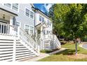 Exterior view of townhome showing siding, stairs, and landscaping at 1405 Attwater Dr, Atlanta, GA 30316