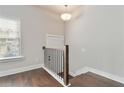 Entryway with a staircase, hardwood floors, natural light from a window, and modern design at 1405 Attwater Dr, Atlanta, GA 30316