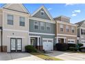 Charming townhome with a one-car garage and a well-maintained lawn at 2656 Avanti Way, Decatur, GA 30035