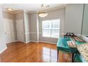 Well-lit dining room with hardwood floors, a bright window, and neutral color palette, ideal for entertaining at 1731 Pryor Sw Rd # 109, Atlanta, GA 30315