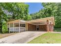 An attached carport that offers seamless access to the home's front entrance at 4016 Nations Dr, Douglasville, GA 30135
