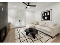 Cozy living room with fireplace, modern furniture, and neutral tones, creating a relaxing atmosphere at 32 Wadley Nw St, Atlanta, GA 30314