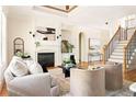 Inviting living room featuring a fireplace, neutral decor, and hardwood flooring at 3512 Centerville Rosebud Rd, Snellville, GA 30039