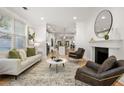 Bright and airy living room with hardwood floors, fireplace and an open floor plan at 770 Ormewood Se Ave, Atlanta, GA 30312