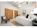 Inviting bedroom featuring ample closet space, plush bedding, and chic decor for a cozy living experience at 881 Memorial Se Dr # 307, Atlanta, GA 30316